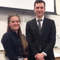 Emily David and Daniel Caylor after their CMB research presentations, 2018